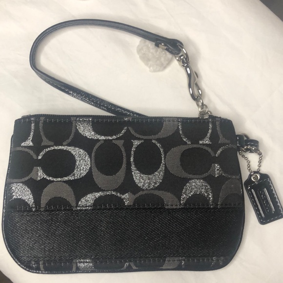 Coach Handbags - COACH black, gray, and silver canvas wristlet.